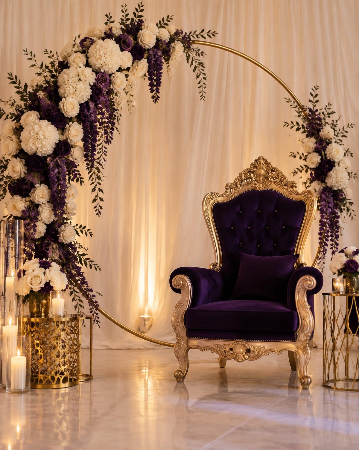 Royal purple throne chair beside a gold circle arch with ivory and purple florals